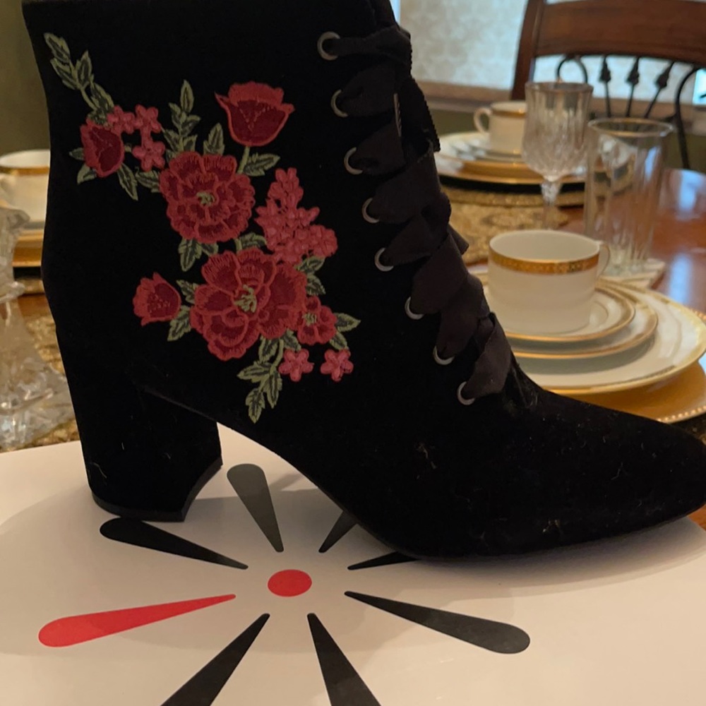 Black boot with flower detail